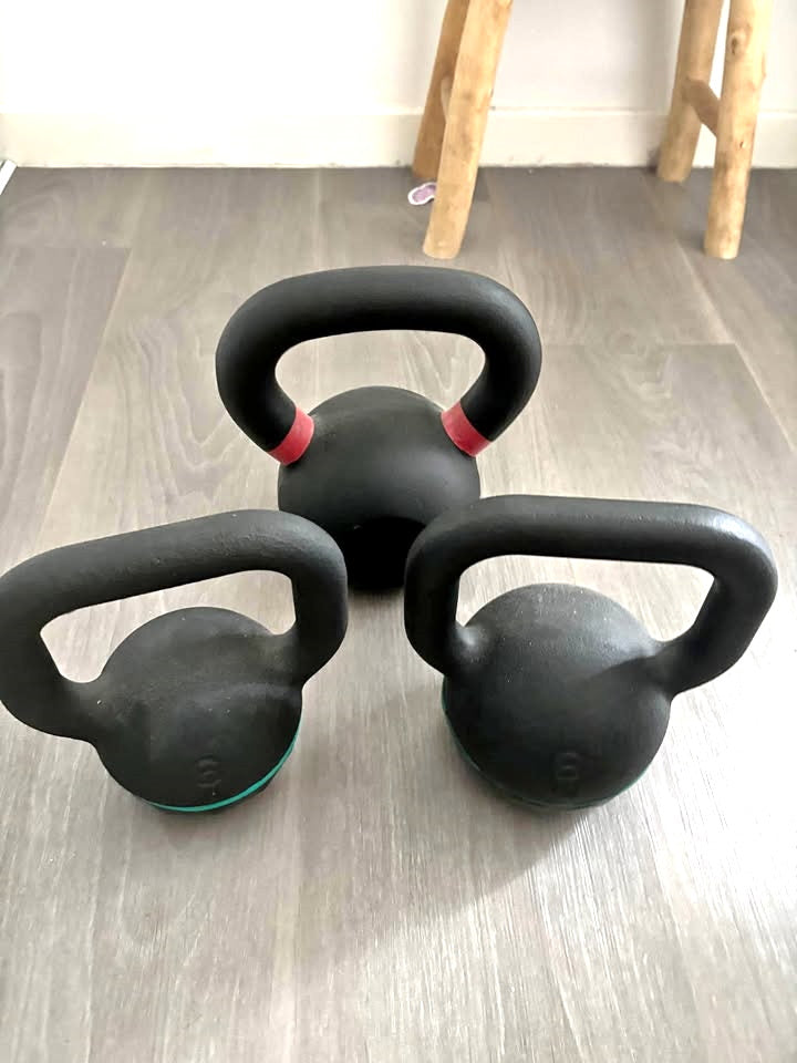 Three kettlebells on the floor, the kind of strength training that protects muscle on a GLP-1