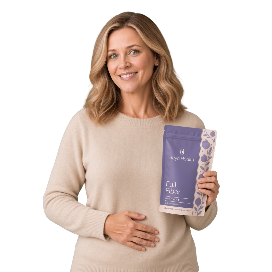 A smiling woman in her forties in a beige sweater holding the Seya Full Fiber pouch, one hand resting on her stomach, on a plain background.